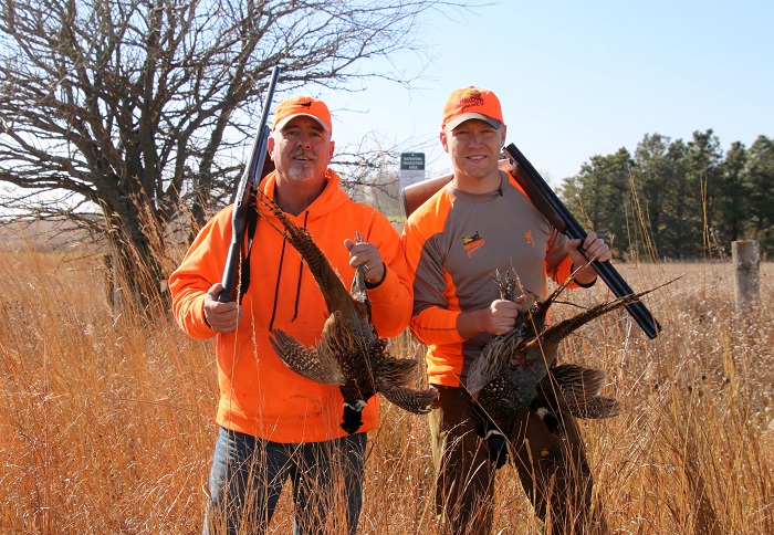 Scott Rall, president of the Nobles County (Minnesota) Chapter of Pheasants Forever, left, and Nick Hoffman after a day spent touring some of the more than 2,000 acres the chapter has helped permanently conserve and open to public hunting.