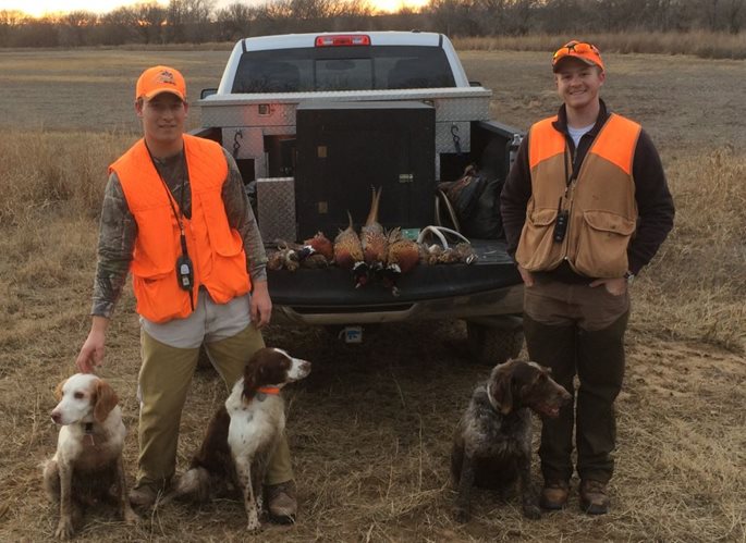 Augustine's son Ted (right) has in turn brought others, such as friend Logan Shetler, into the hunter-conservationist fold.